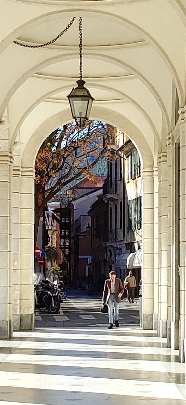 A picture containing building, arch, colonnade, stoneDescription automatically generated