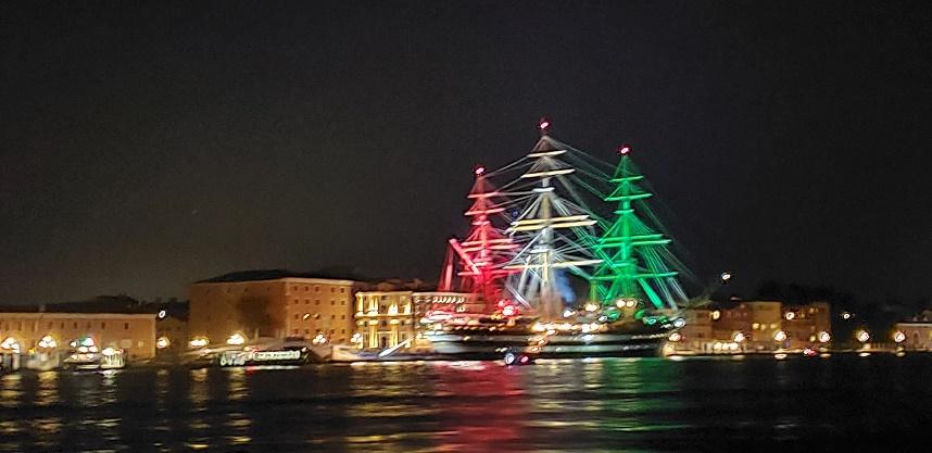 A picture containing lit, light, night, cityDescription automatically generated